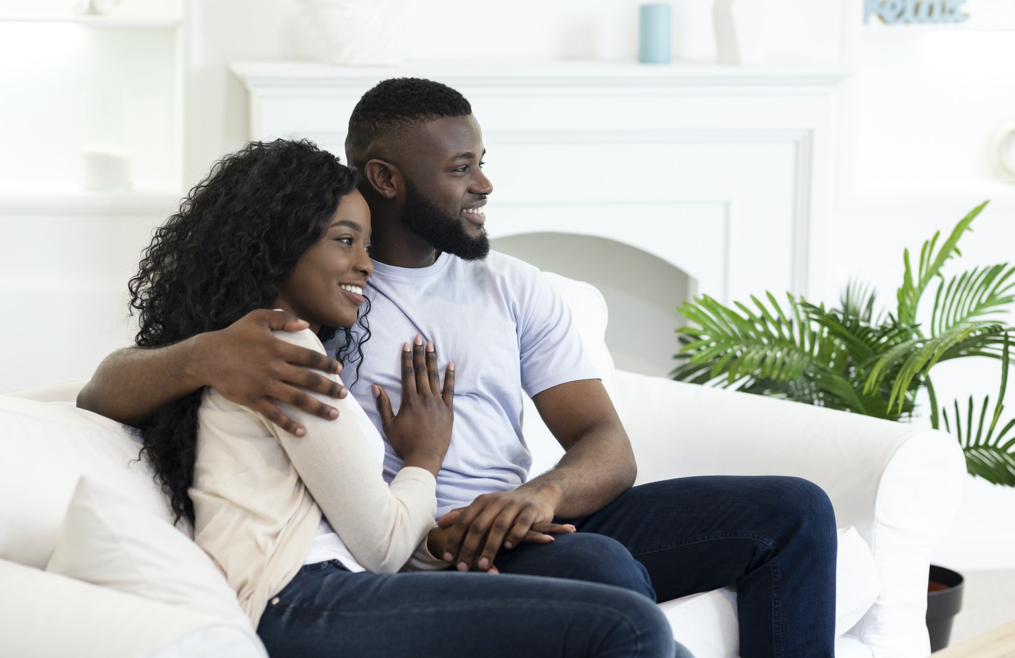 Married black couple enjoying weekend at home